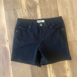 Never worn black shorts. Size 8.